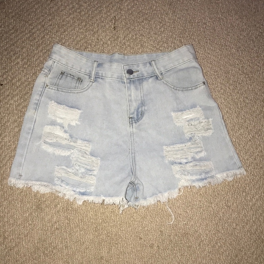 light washed ripped jean shorts